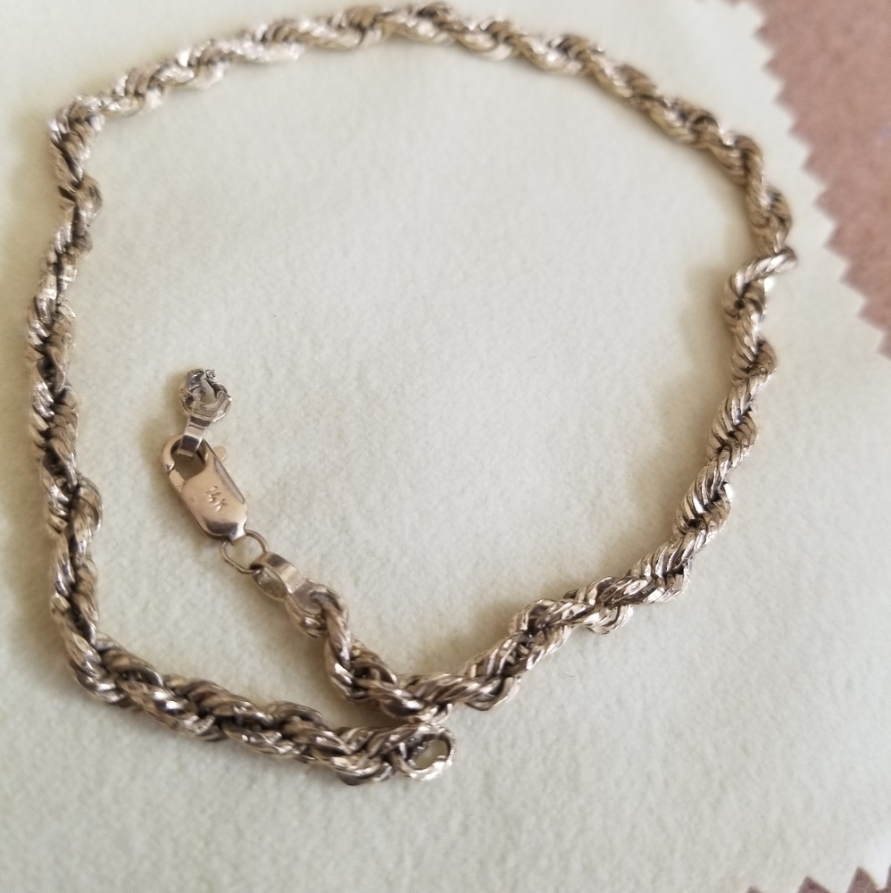 14k yellow gold rope bracelet.